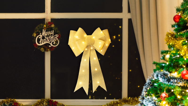 LED karácsonyi masni, arany, elemes, Timer 6+18h,25LED, 3000K, 2xAA ,CHRBOG25WW