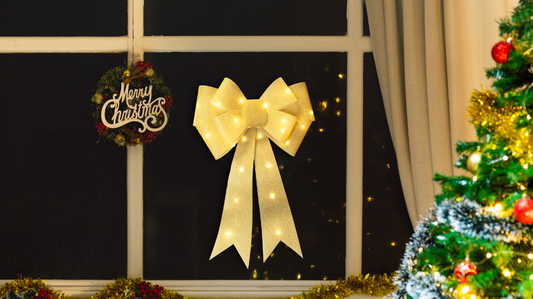 LED karácsonyi masni, arany, elemes, Timer 6+18h,25LED, 3000K, 2xAA ,CHRBOG25WW